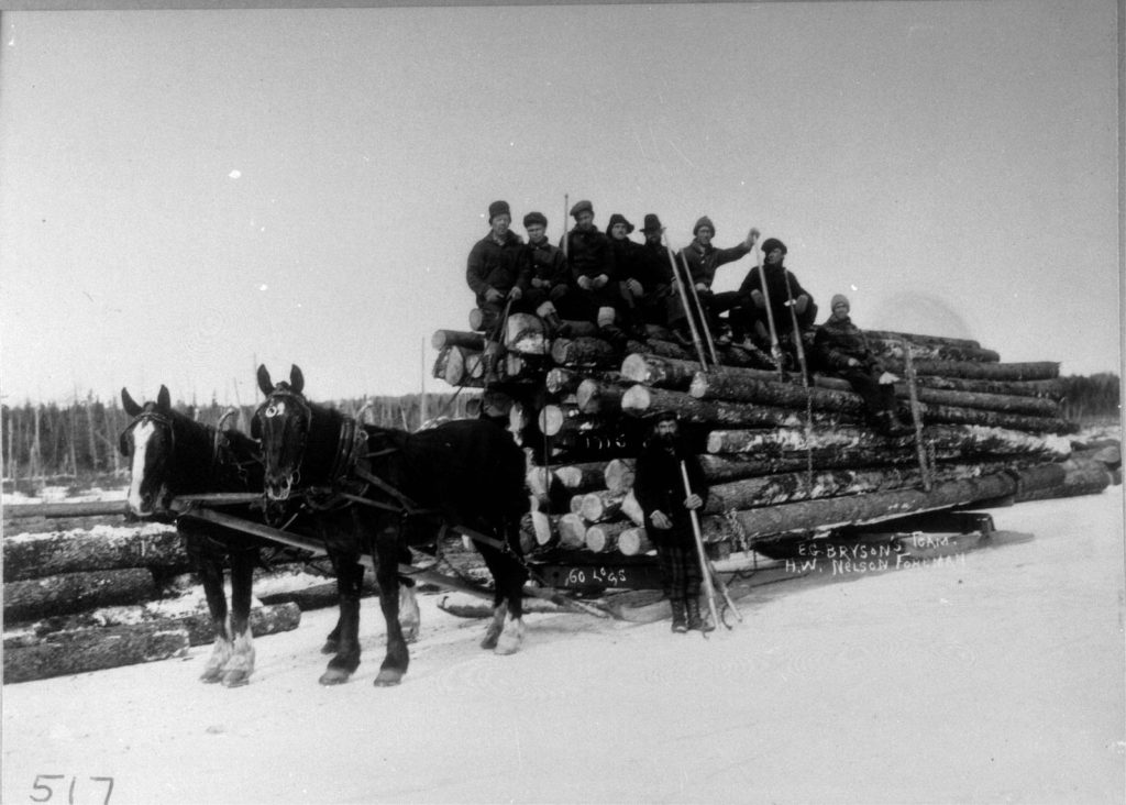"Heavy load of logs pulled on ice."
